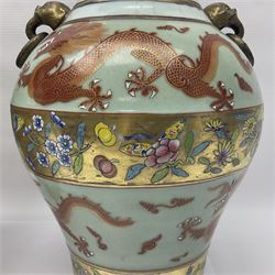 Pair of early 20th century Chinese vases decorated with dragons chasing a flaming pearl, with a gilt border of butterflies and floral sprigs, with Elephant head handles, H44cm 