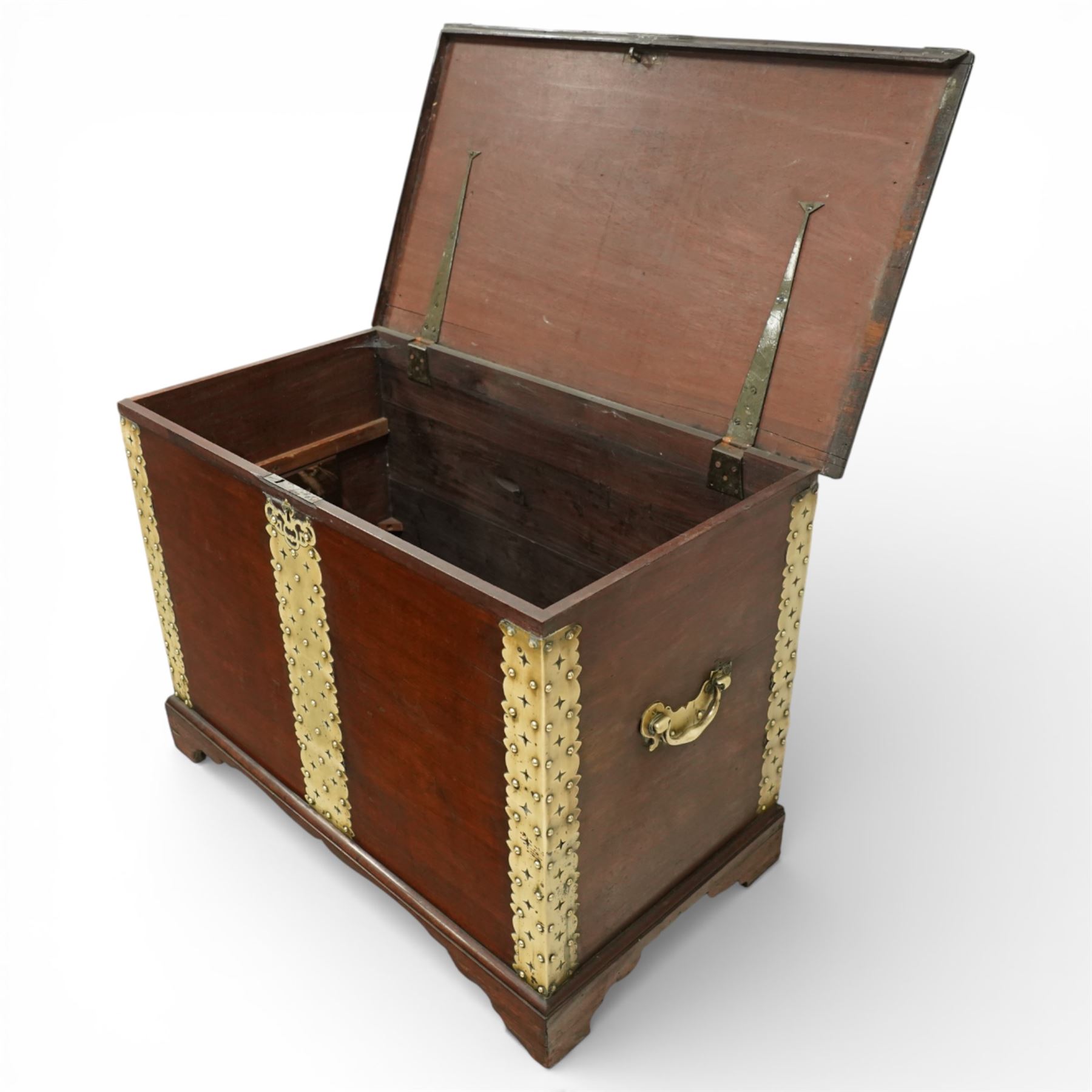 Georgian mahogany brass bound plate chest, the rectangular hinged top mounted with pierced and studded brass straps, fitted with pierced brass escutcheon and large brass handles to the side, lower moulded edge on bracket feet