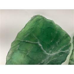 Pair of green fluorite slices, polished with rough edges, H16cm, L17cm  