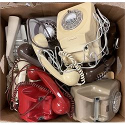 Collection of eight vintage telephones, including a trimphones telephone