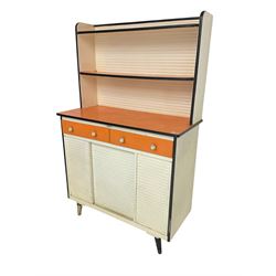 Table-Ette - mid-20th century kitchen unit, fitted with two shelves over two drawers and double cupboard, in orange and white finish