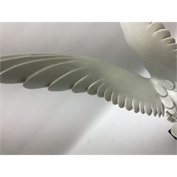 1930s Meissen figure of a seagull designed by Max Esser, modelled upon the crest of a wave with wings spread above its body, upon black square base, with blue cross swords mark, H43cm