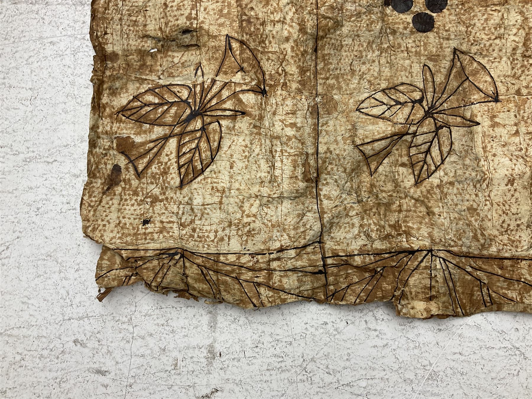 Collection of traditional necklaces from the Solomon Islands, including shell and boar tusk examples, together with a carved canoe prow, with mother of pearl eyes, painted cow hide and a copper plaque, depicting the Solomon Islands, with presentation engraving