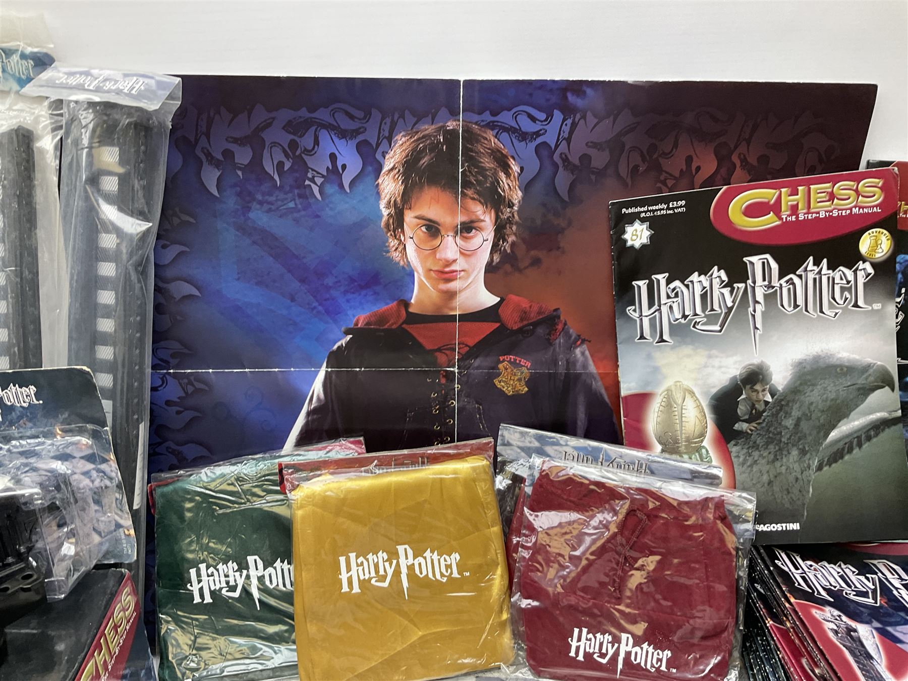 Complete DeAgostini Harry Potter chess step by step course with accessories, wand etc, including periodicals Nos. 1-82 (lacking No.68) with four binders, two chess sets with framed board, one traditional style the other fantasy, in original box.