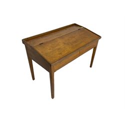 Late 19th century walnut school desk, sloped hinged lid, on square tapering supports 