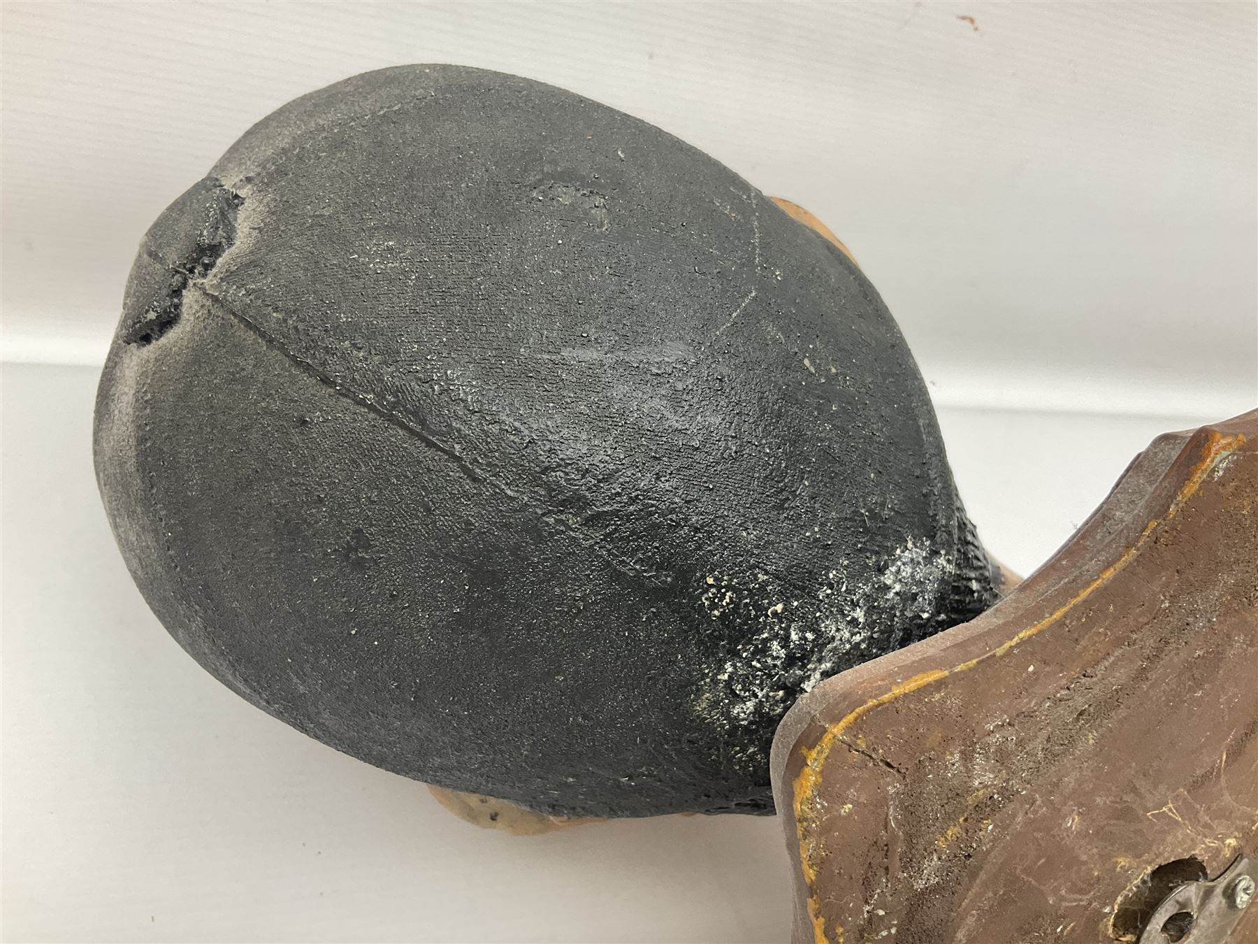 Composite figure of the head of a huntsman on a shield 'Caught by the Fox', D28cm