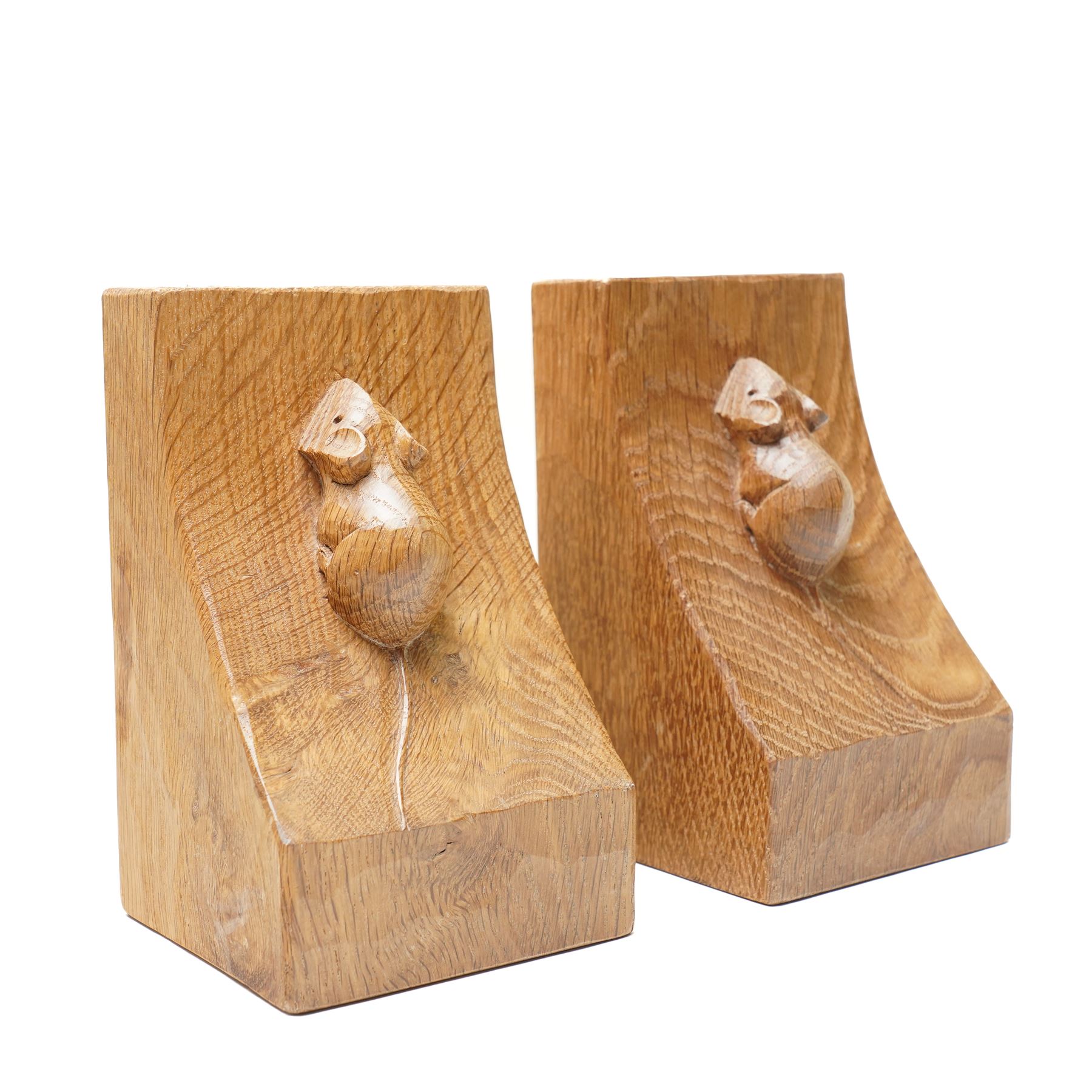 Mouseman - pair of adzed oak bookends, carved with mouse signature, by the workshop of Robert Thompson, Kilburn H15cm