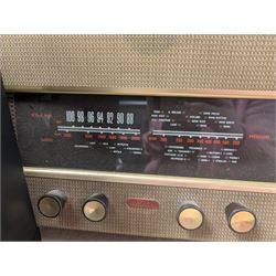 Mid 20th century Murphy radio, together with a Peavey KB/A 15 keyboard amp and pedal