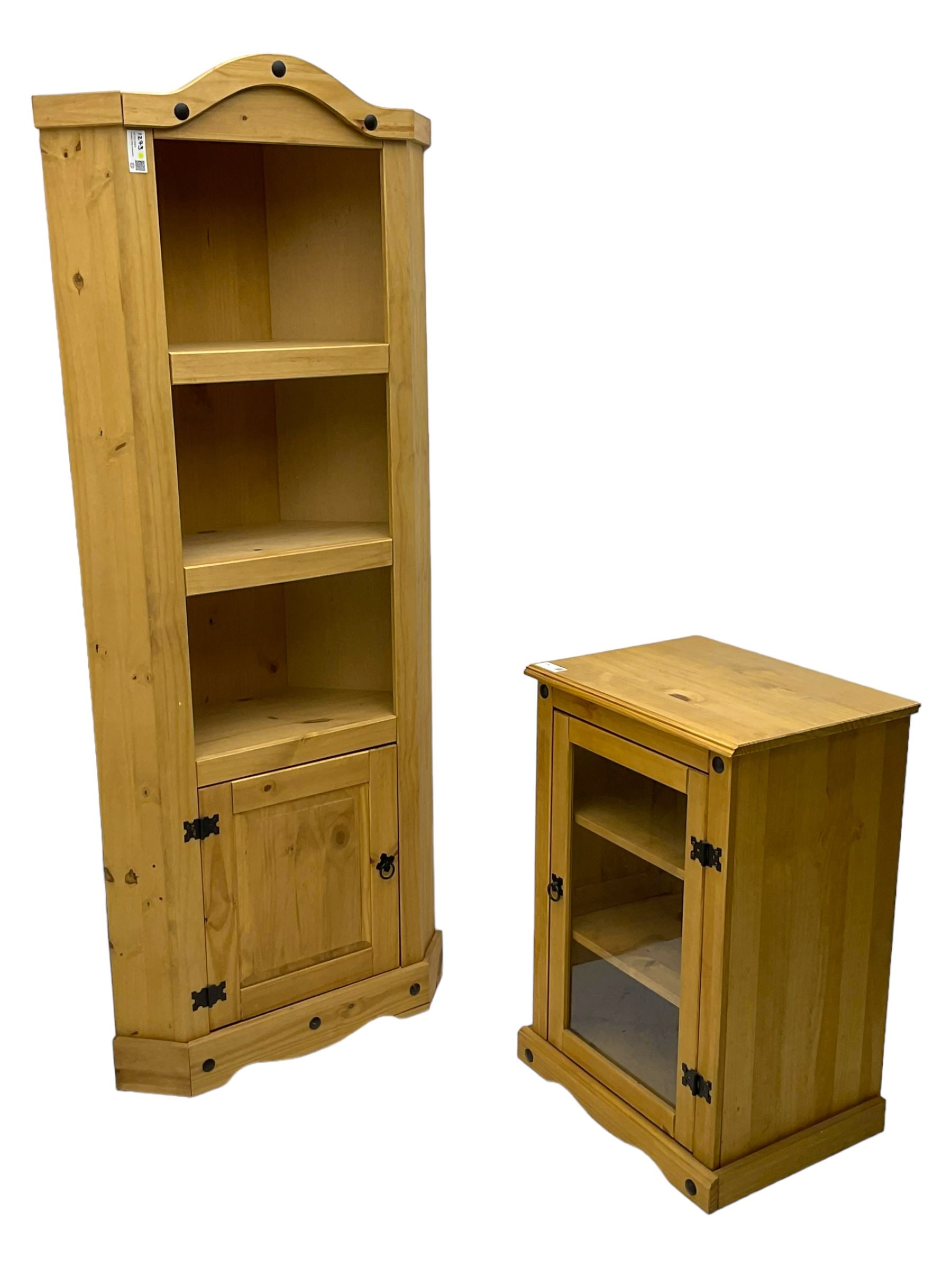 Pine media or television cabinet, enclosed by single glazed door (W56cm, H82cm, D43cm); pine corner cupboard, three shelves over single cupboard (W76cm, H188cm); pine two-tier plate rack with shaped frieze and uprights (W113cm, H107cm)
