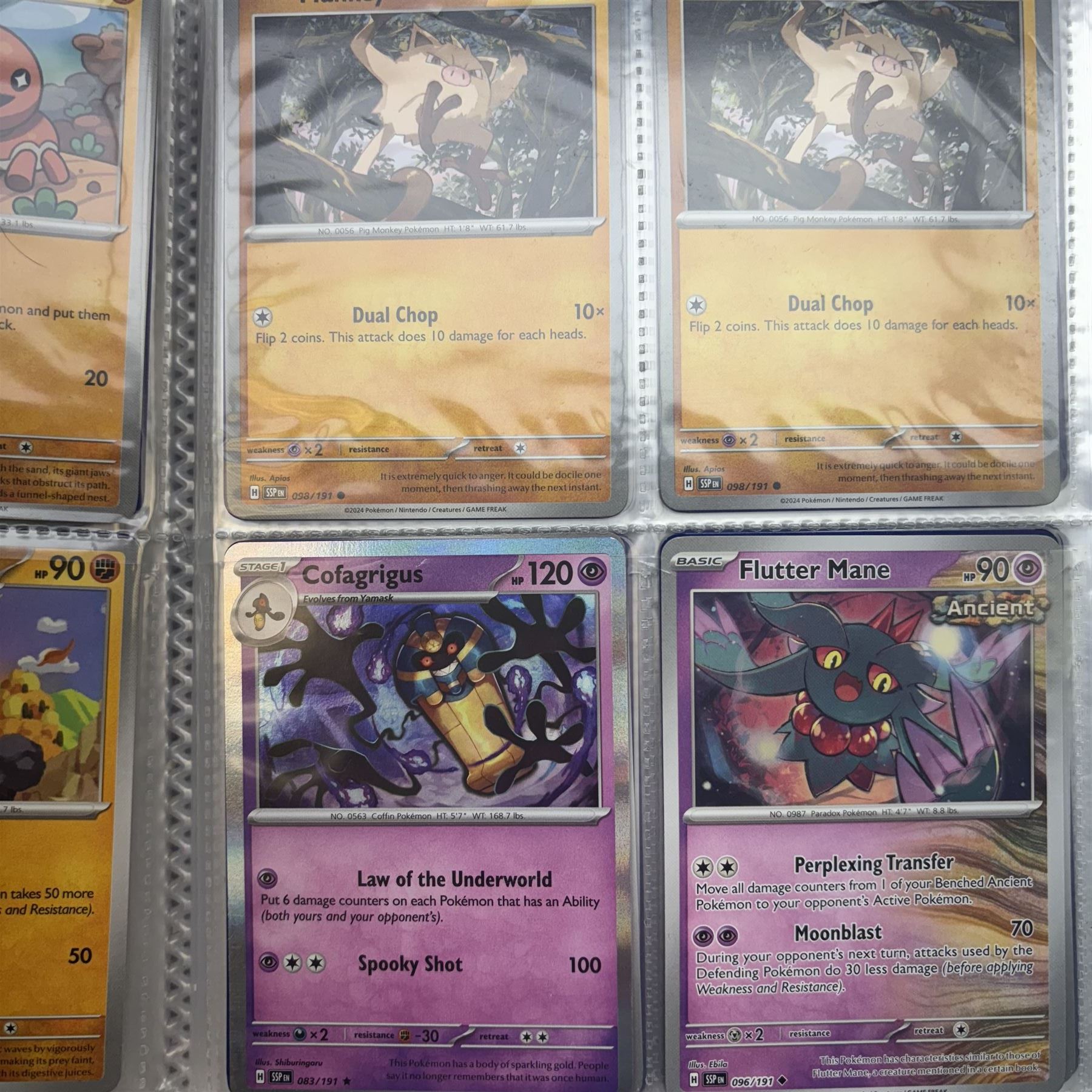 Collection of modern Pokemon TCG trading cards from the Scarlet & Violet and Sword & Shield eras, contained within in two folders, opened packets and loose, together with a graded Sword & Shield Silver Tempest Passiman TG08, GET Graded 9 Mint, two oversized cards, energy cards, vintage booklets and boxes, empty tins, 1998 Electronic Pokédex and other accessories