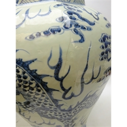  Large pair of Chinese blue & white vases octagonal baluster bodies decorated with four clawed Dragon Chasing Pearl, domed covers with Dog of Fo. finials, H58cm (2)  