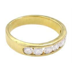18ct gold channel set seven stone round brilliant cut diamond half eternity ring, stamped 750, total diamond 0.60