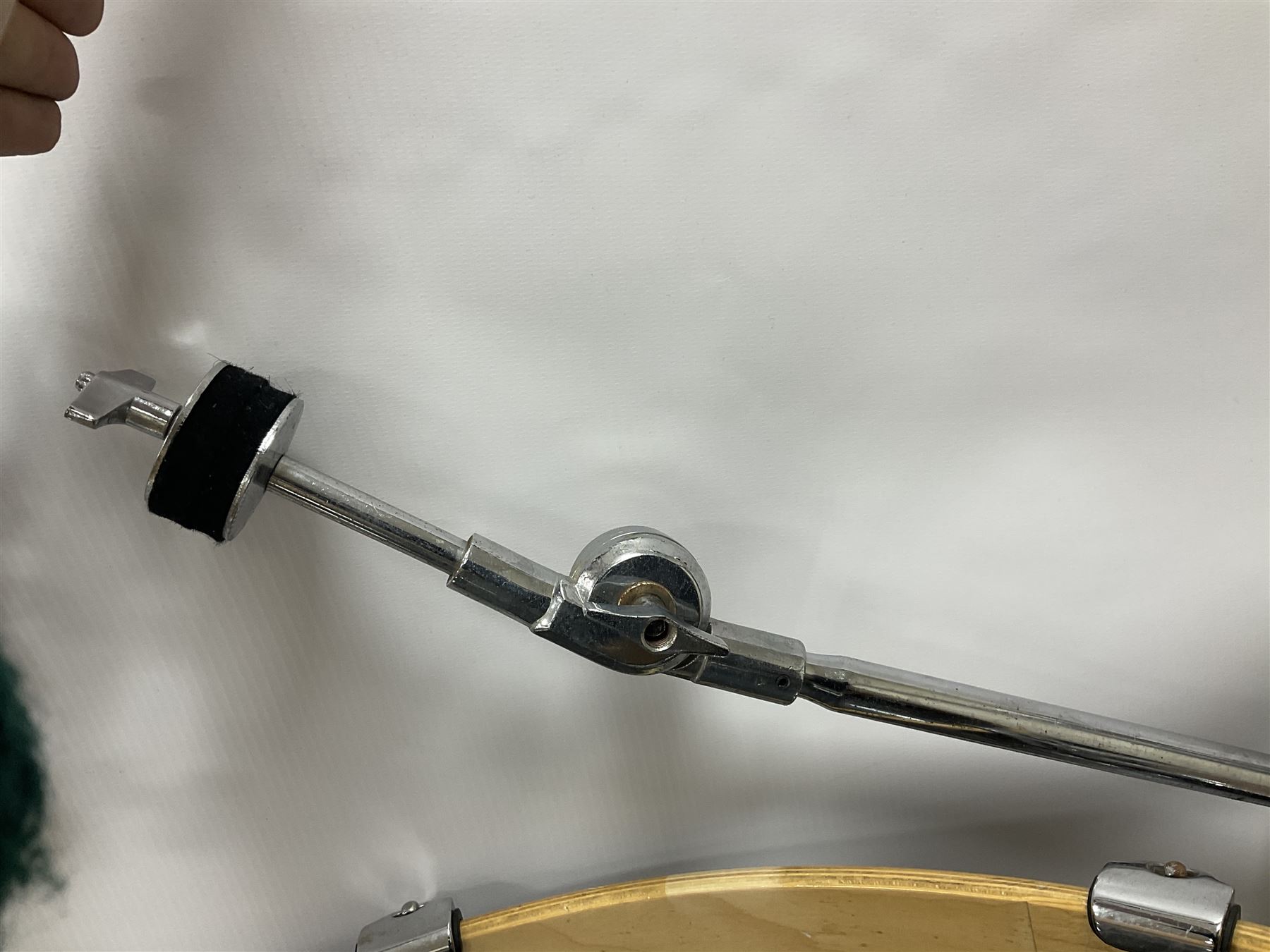 Pearl Vision SST Birch Ply shell four-piece drum kit in black comprising bass drum with foot pedal and three graduated toms; together with Pearl Custom Alloy Sensitone steel snare drum, drum and cymbal stands, microphone stand, stool and various drum sticks 