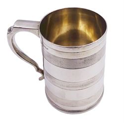 Victorian silver mug, of tapering cylindrical form with three reeded bands to body and flat topped and curved handle, hallmarked Josiah Williams & Co, Exeter 1877, H12cm, approximate weight 8.55 ozt (266 grams)