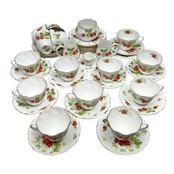 Ringtons and Queen's China Virginia Strawberry pattern teawares, including teacups, saucers, milk jugs, sugar bowls, etc