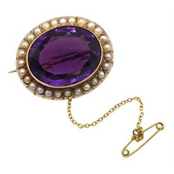 Victorian seed pearl and amethyst gold brooch, the oval shaped amethyst set within a surround of seed pearls