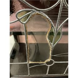 Late 19th century mahogany Empire style display cabinet, swan neck pediment and carved urn finial over two lead glazed doors enclosing two shelves, two glazed doors under, raised on cabriole front supports