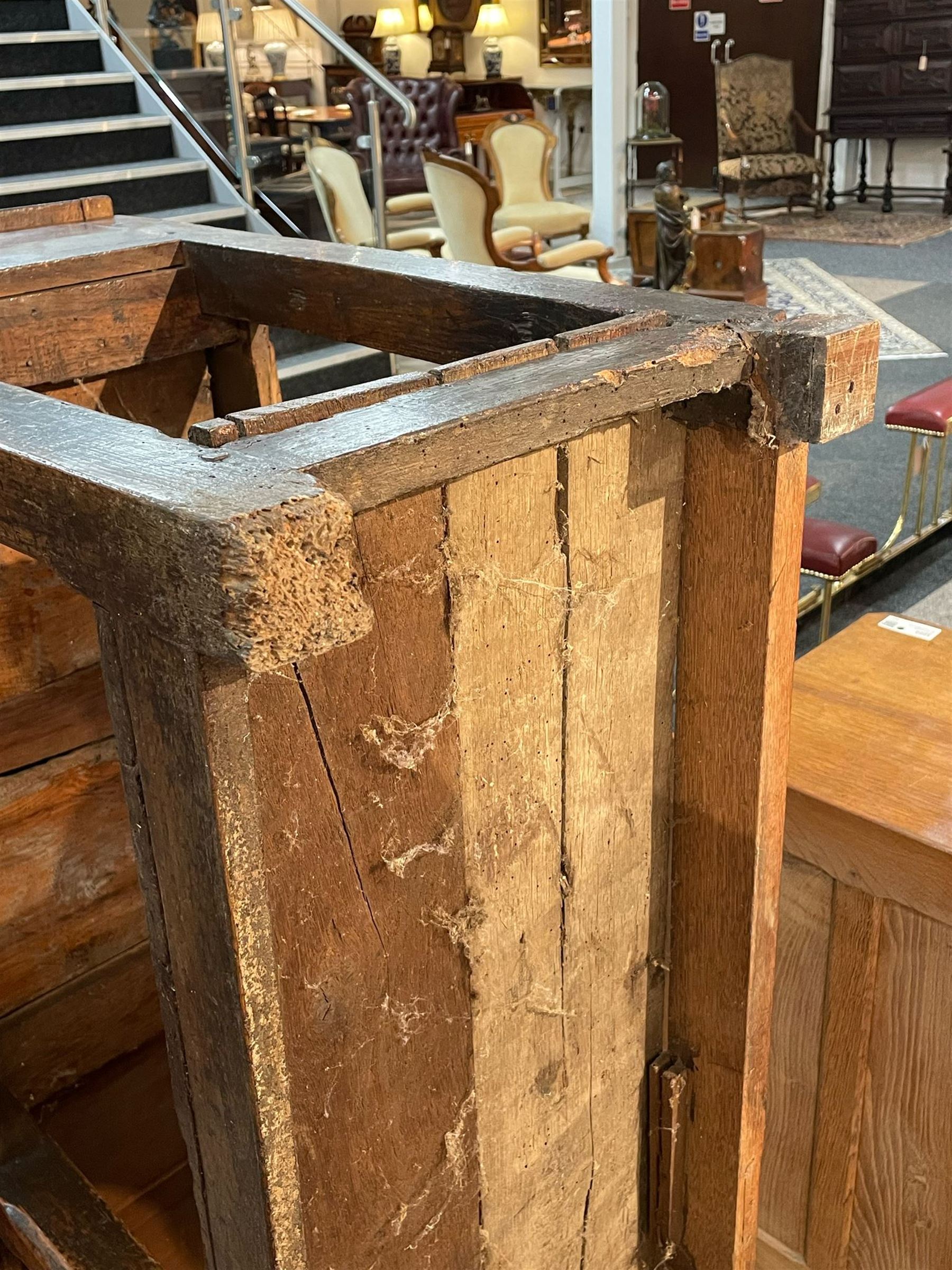 18th century oak dresser base, moulded rectangular top over two drawers and shaped apron, moulded drawer fronts fitted with shaped brass handle plates and swan neck handles, on chamfered square supports united by pot board base 