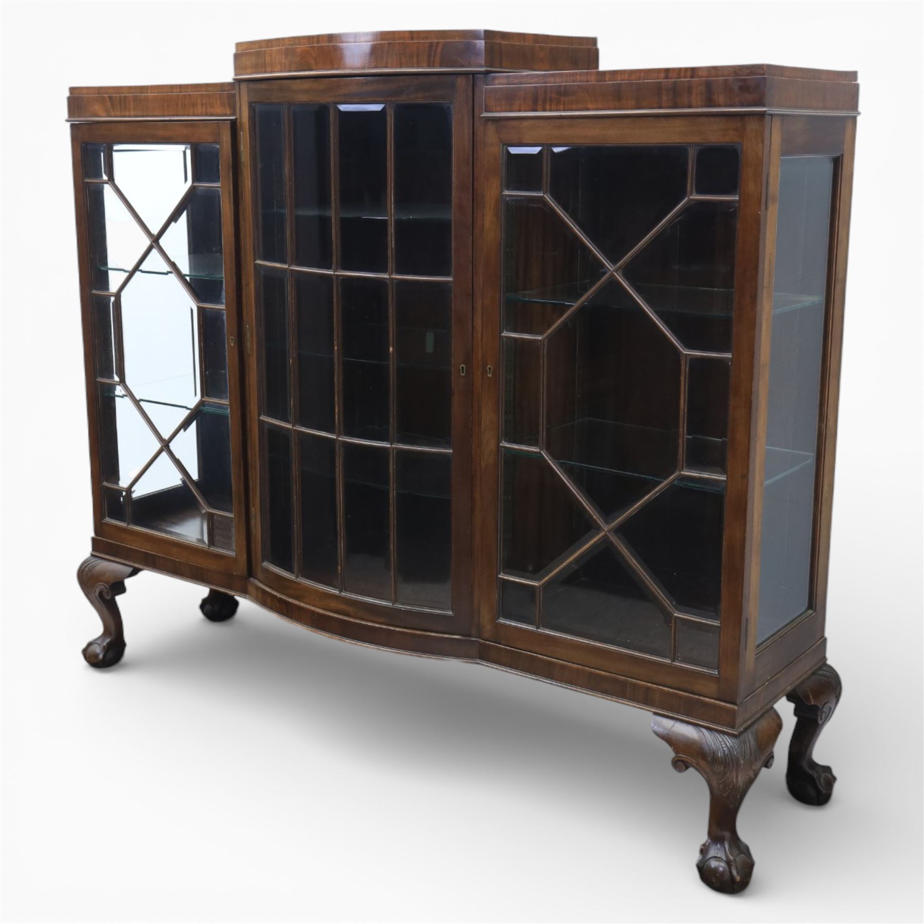  20th century large mahogany breakfront bookcase, with astragal glazed doors revealing an adjustable glass shelved interior, raised on ball and claw feet 