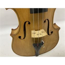 Copy of a full size Stradivarius violin, with an ebonised fingerboard, tailpiece and tuning pegs Length 60cm