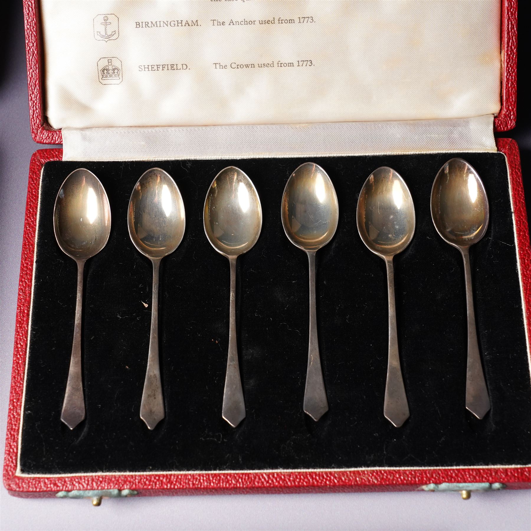 Set of six silver coffee spoons with examples of various British hallmarks , boxed, a set of six silver coffee spoons Sheffield 1925 Maker John Round & Son Ltd and six silver handled pastry knives