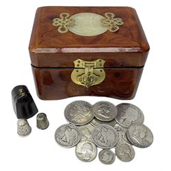 United States of America coins including 1900 Dollar, 1922 and 1923 Dollars, various half dollars etc, a cased hallmarked silver thimble and another thimble, housed in a small box