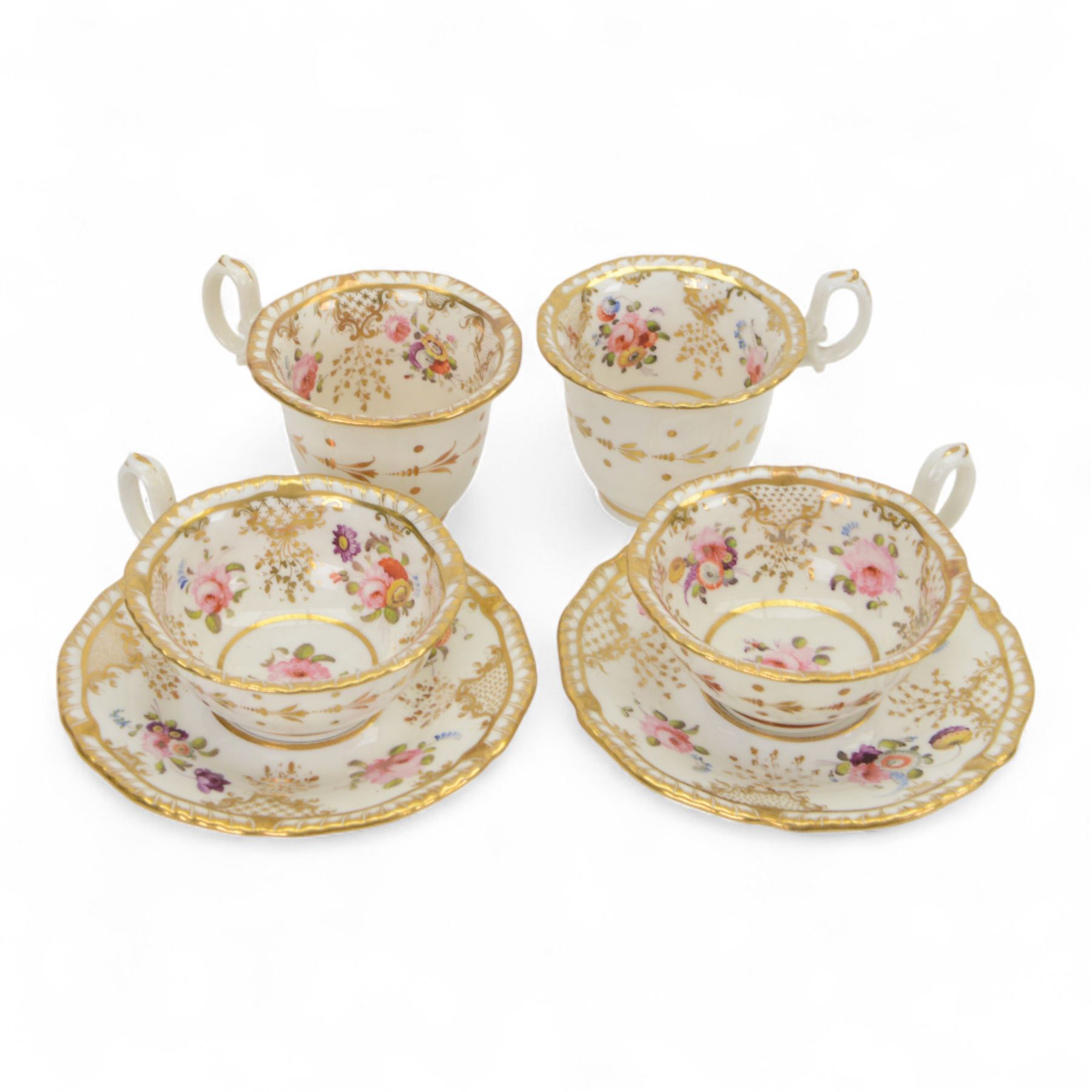 H&R Daniel, pair of trios, coffee cup, teacup and a saucer, circa 1826
pattern 4057, 'Second Gadroon Variation A', painted with fine foliate sprays and gilt hatched reserves, coffee cup including handle H8cm, saucer D14cm