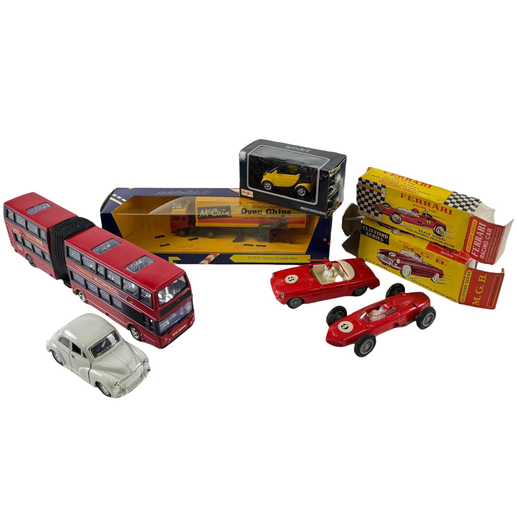 Collection of Tri-ang Railways OO gauge locomotive models including R50 4-6-2 Princess Victoria Black Livery and various accessories; three Kitmaster Corridor Composite OO gauge kit built model in green, together with a collection of die-cast toy vehicles including Clifford Series Ferrari Racing Car and M.G.B, mostly boxed