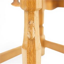 Mouseman - oak dressing table stool, the rectangular tan leather padded seat with studwork border, raised on octagonal supports united by box stretcher, carved with mouse signature, by the workshop of Robert Thompson of Kilburn