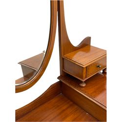 Edwardian inlaid mahogany dressing table, oval swing mirror, trinket drawers, above two small and two long drawers