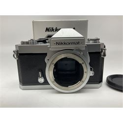 Nikkormat FT2 camera body, serial no. 5066813, in original packaging, together with Nikkormat EL camera body, serial no. 5577358, with Nikon Nikkor 50mm 1:1.8' lens no. 2143575, Nikkormat FT, serial no. 3968385, and Nikomat FT camera body, serial no. 4015491