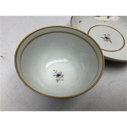 Two 18th century Newhall tea bowls and saucers, the first example decorated with pattern no 195, hand painted painted with floral sprays, the second hand painted with flowers in a gilt boarder, together with a similar tea bowl