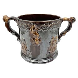 Large 19th century Staffordshire treacle glazed frog loving cup, the treacle glazed body decorated in relief with busts of Nelson, other naval figures, tavern scenes and fighting dogs, the interior with two pottery frogs in buff and treacle glazes, H17cm 