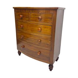 Victorian mahogany bow-fronted chest, fitted with two short over three long graduated cockbeaded drawers, on turned bun supports