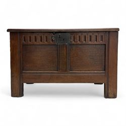 18th century oak blanket box, the triple panelled top above a front carved with repeating ...