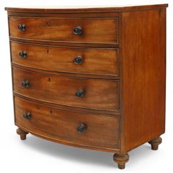 Mid-19th century mahogany bow front chest, fitted with four graduating drawers, turned ebonised handles, bun feet