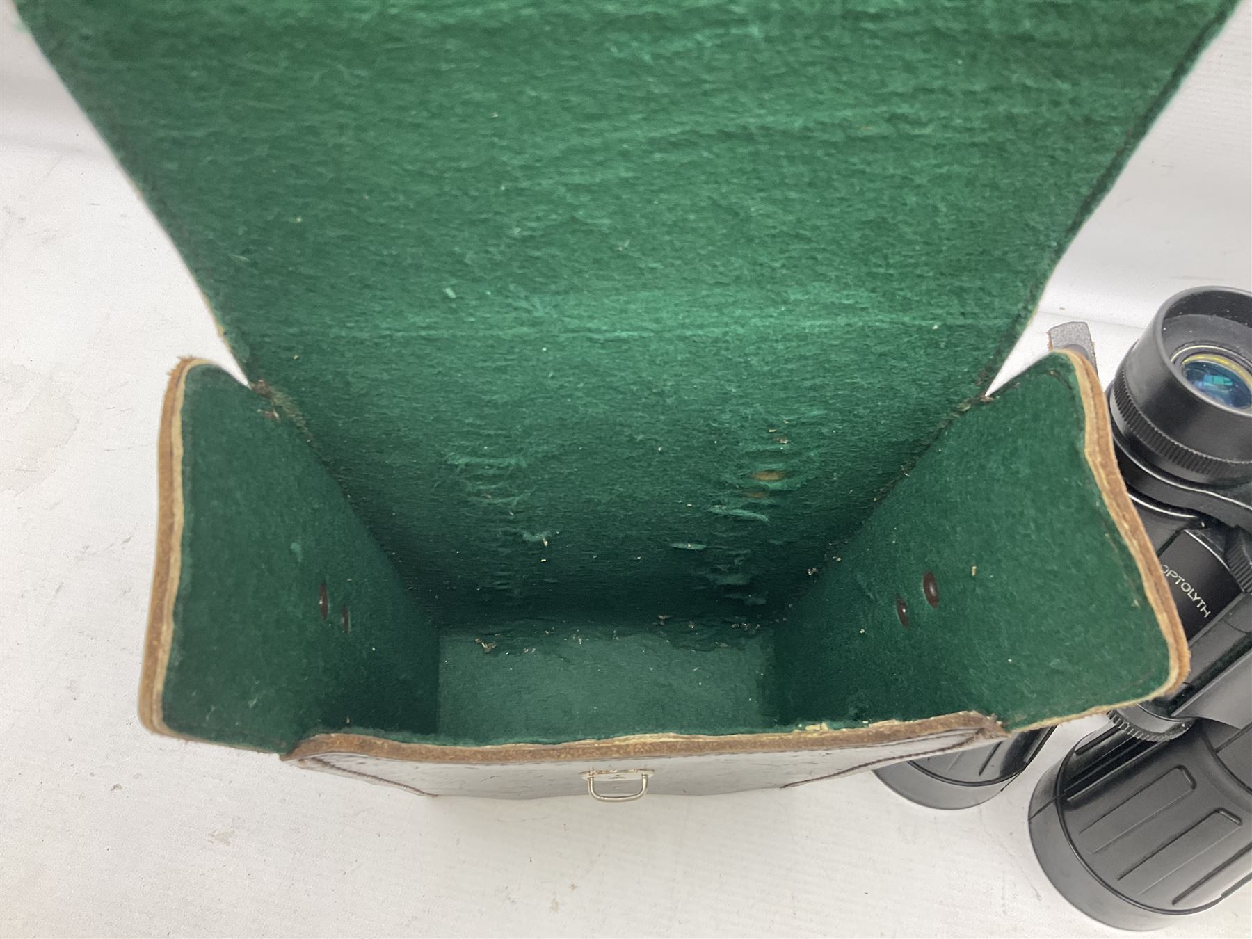 Pair of Optolyth 12 x 63 binoculars, made in Germany, serial no 82186, in leather case