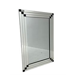 Contemporary mirror, frame comprised of rectangular bevelled plates