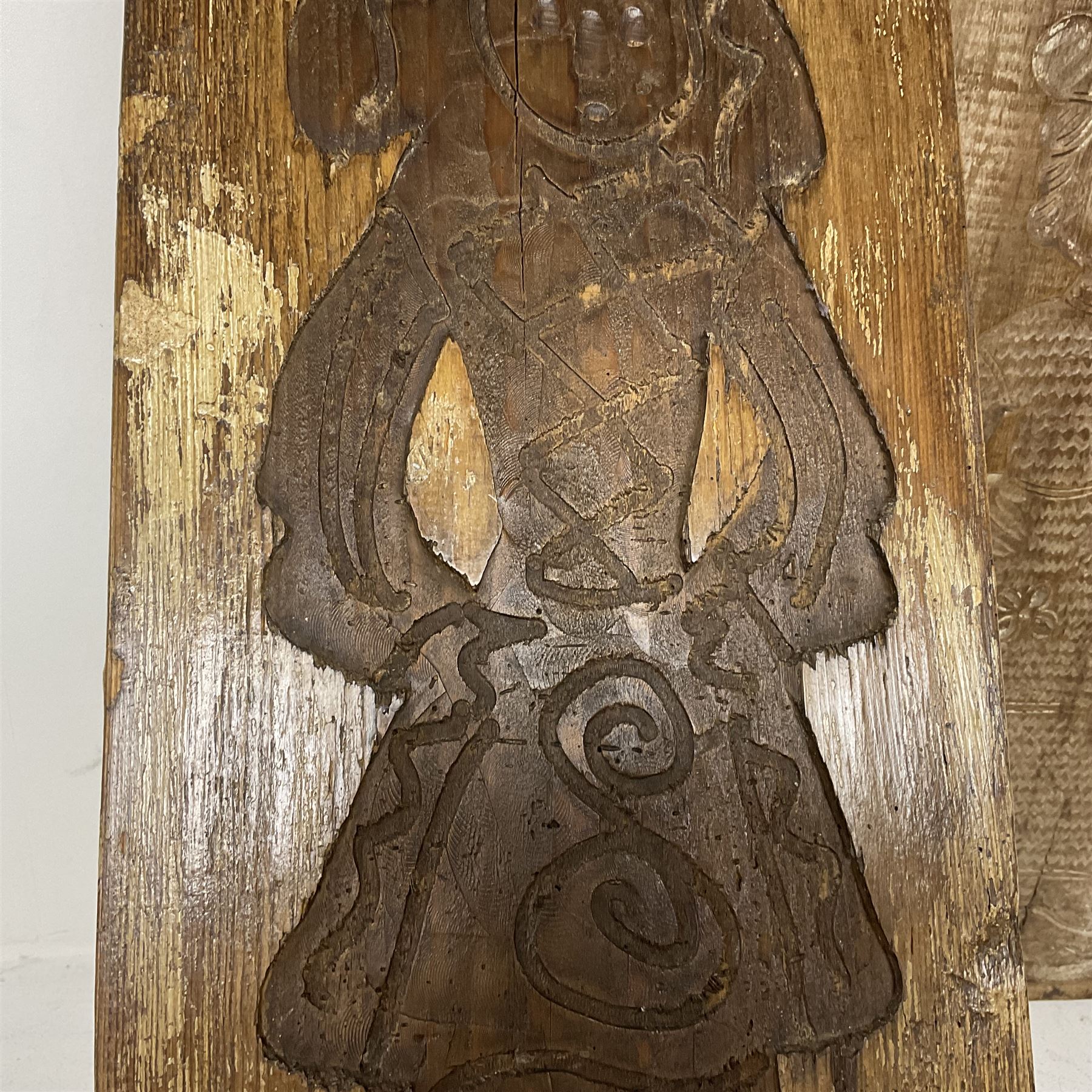 Two 20th century hardwood Dutch folk art Speculaasplank or biscuit moulds, typically carved with figures in traditional dress, largest H101cm