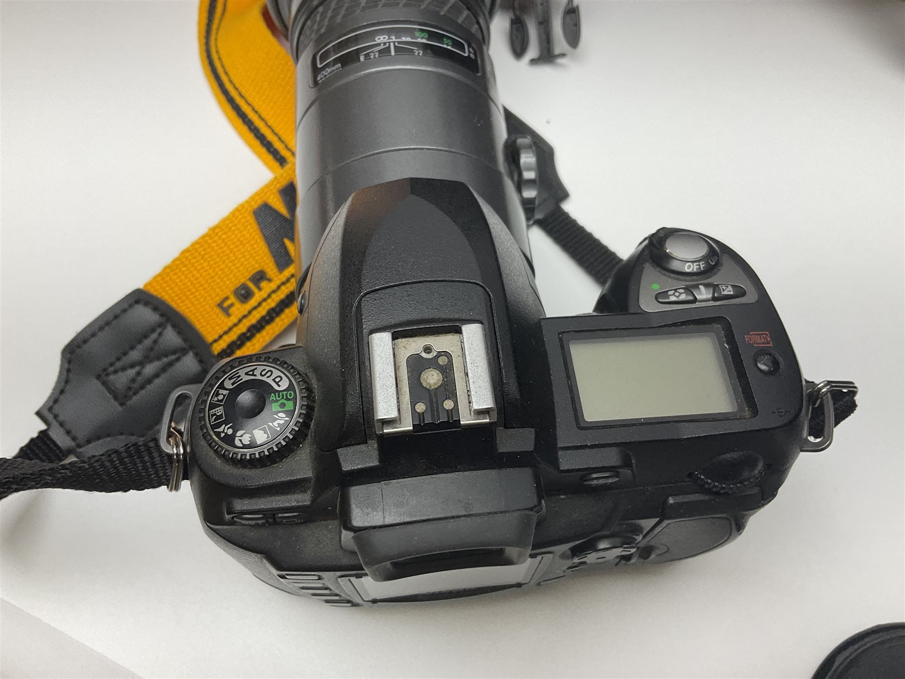 Four camera bodies, to include, Ricoh KR-10 serial no. 38826, Pentax MZ-M serial no. 4185969 with 'SMC Pentax- M 1:3.5 28mm' lens, Canon EOS500 serial no. 080927, with 'Sigma Zoom 100-300mm 1:4.5-6.7 DL'  lens etc, with other camera lenses and equipment 