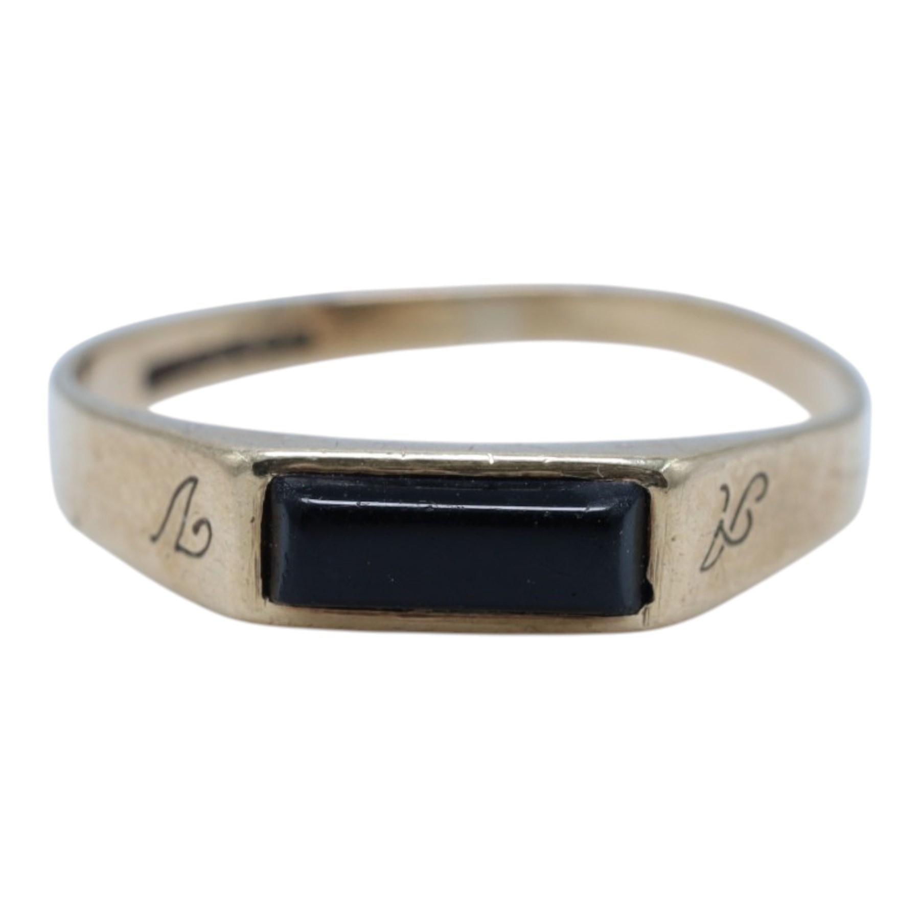 Two 9ct gold stone set rings, comprising paste set eternity ring and an onyx ring, both hallmarked