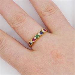 18ct gold nine stone, ruby, emerald, sapphire and diamond ring, stamped 750