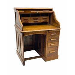 Early 20th century roll top desk, single pedestal fitted with four graduating drawers