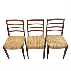 Mid-20th century teak oval extending dining table with set of six teak ladder back chairs with upholstered seats, table W150xD91xH74cm, 199cm extended, chairs W41xD43xH94cm