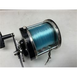 Four Abu fishing reels, comprising Ambassadeur 9000, Ambassadeur 7000, Ambassadeur 5500 and Ambassadeur 6500, together with additional line, hardy fishing bag and two wooden boxes