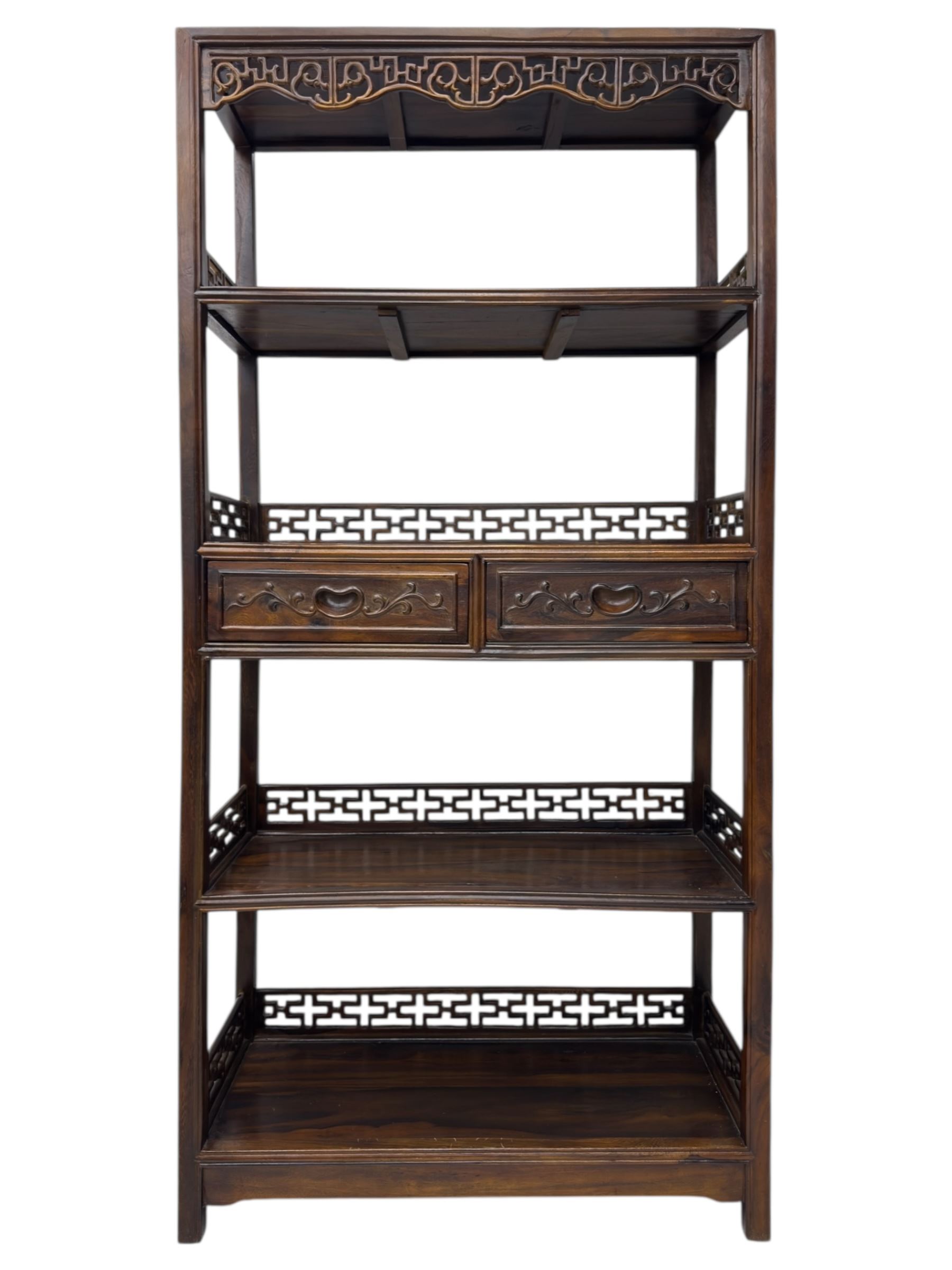 Early 20th century Chinese hardwood display étagère bookcase, the rectangular open tiered frame with pierced frieze and geometric openwork gallery to each shelf, fitted with two short drawers carved with stylised lotus motifs, supported on square uprights with pierced apron and integral gallery rails