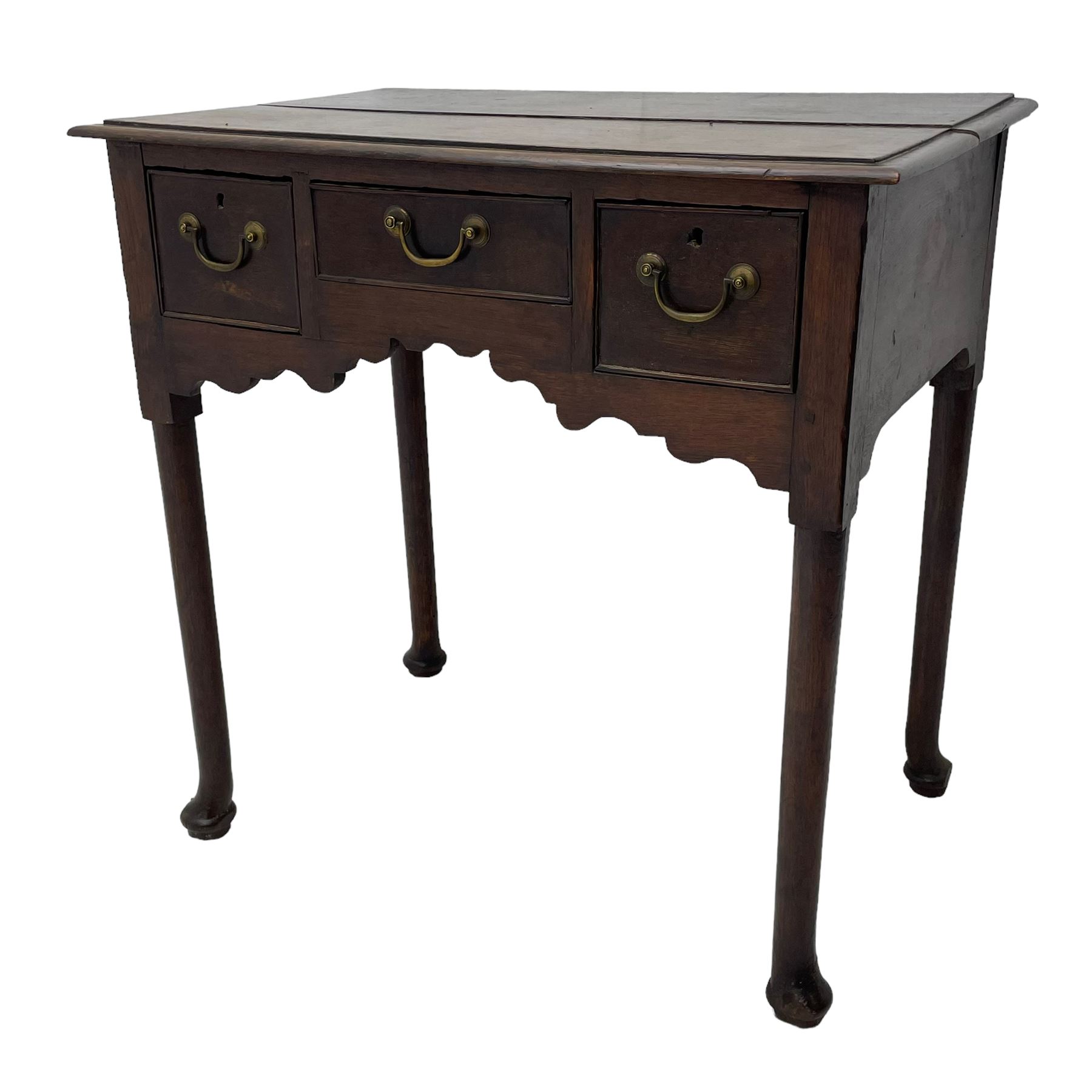 18th century oak low-boy, ovolo-moulded rectangular top over three cock-beaded drawers, circular brass handle plates and D-shaped handles, shaped and stepped arched apron, on cabriole supports 