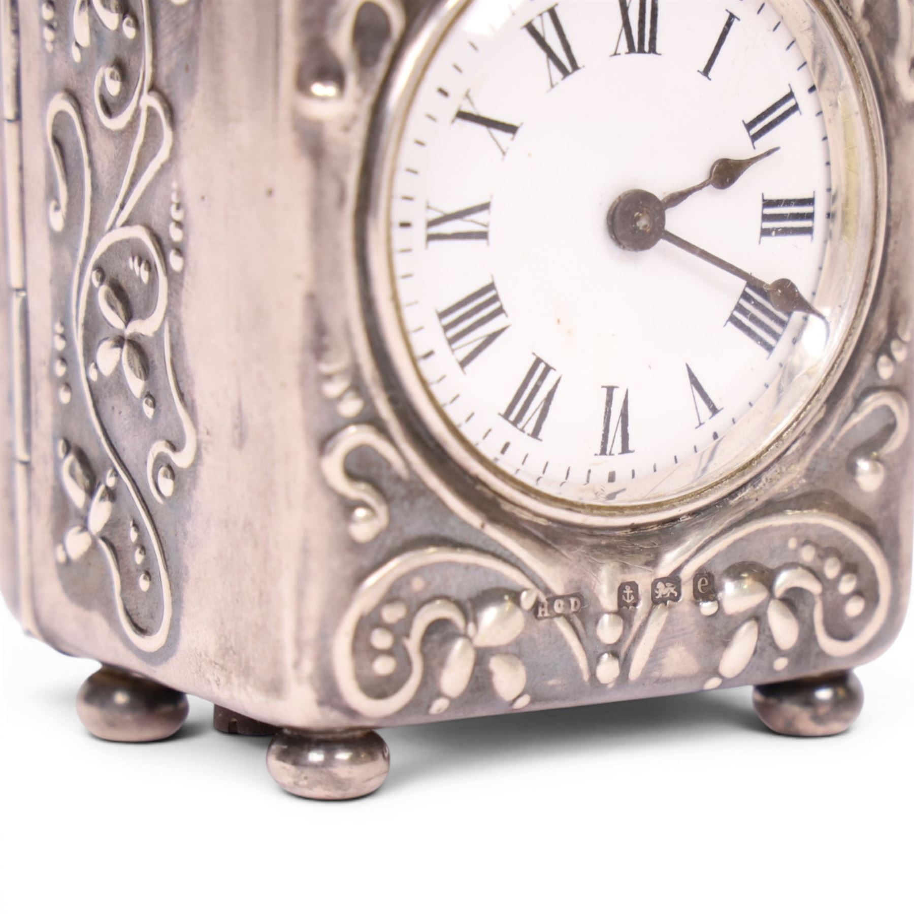 Edwardian miniature silver cased carriage clock timepiece, hallmarked Henry Clifford Davis, Birmingham 1904, the white enamel dial with roman numerals, French movement with fixed key wind, H8cm