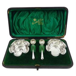 Pair late Victorian silver open salts, each of circular form with crimped rim, hallmarked Horace Woodward & Co Ltd, London 1897, and a pair of salt spoons, hallmarked John Grinsell & Sons, London 1898, contained within a fitted case, approximate total silver weight 1.02 ozt (32 grams)
