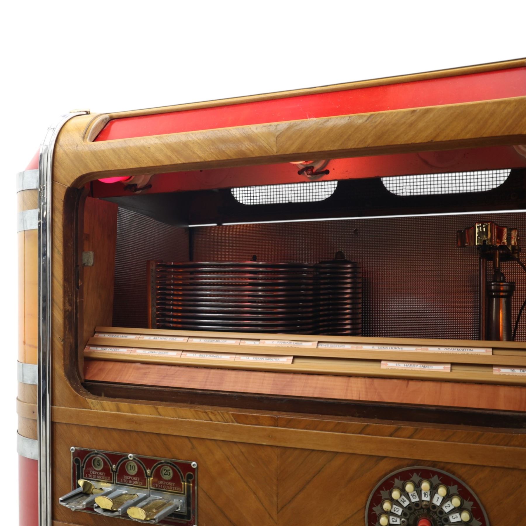 Rudolf Wurlitzer Company - Model 616 'Simplex' 1937 jukebox, figured walnut veneered cabinet with illuminated red and amber side panels enclosed by chromed uprights, glazed upper record compartment, cast Art Deco speaker grille, coin-operated push-button selection panel with circular title index, raised on a moulded base